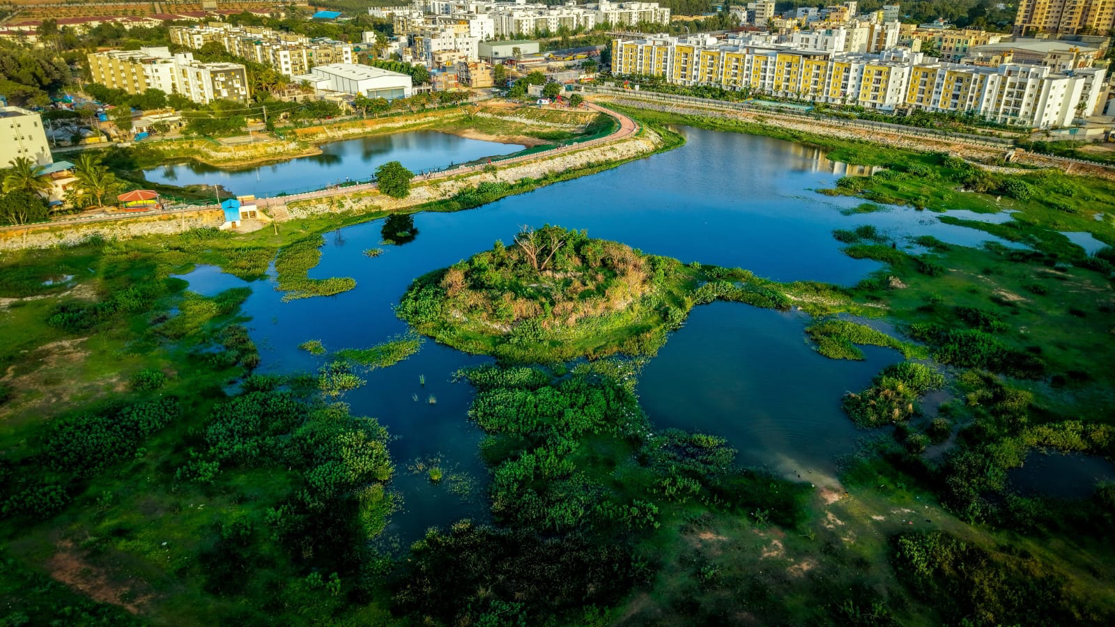 Aerial view of the lake walking track and playground